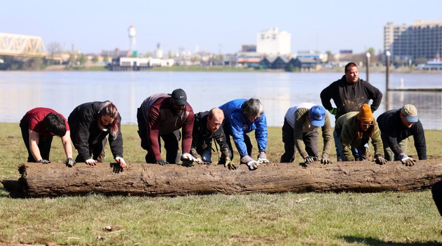 People roll log at Waterfront Park