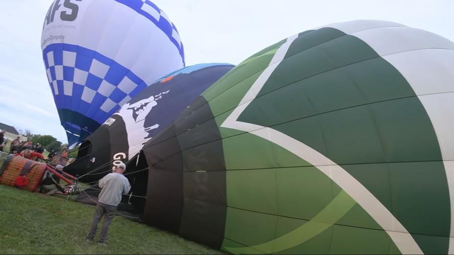 Hot Air Balloons being inflated at Bowman Field for Great Balloon Rush Hour Race