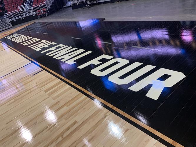 NCAA FLOOR  BEING INSTALLED AT YUM CENTER 3-21-2023 (35).JPG