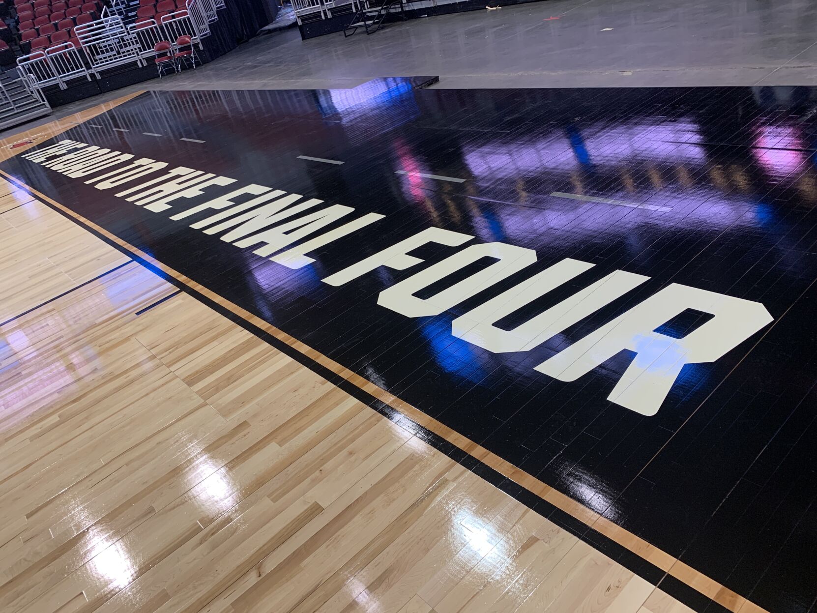 NCAA FLOOR  BEING INSTALLED AT YUM CENTER 3-21-2023 (35).JPG