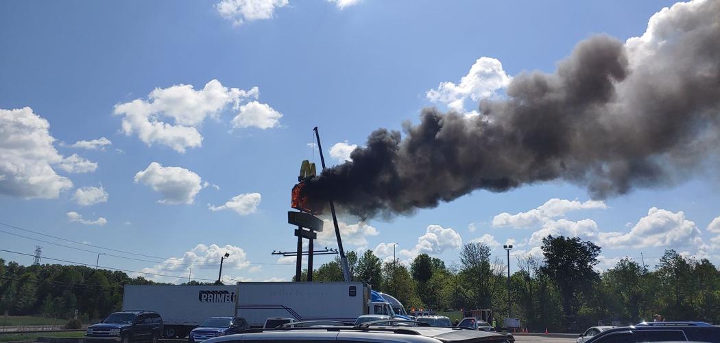 Pilot gas station sign on fire