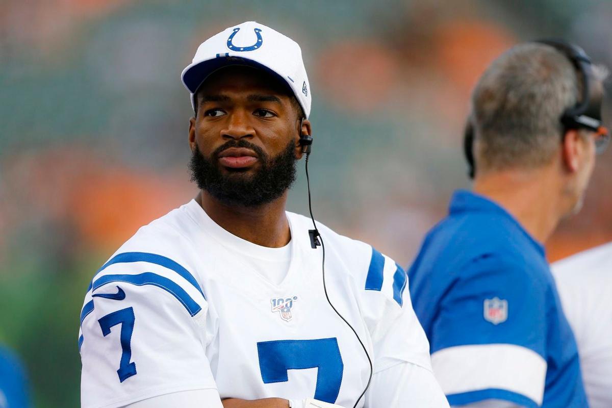 Indianapolis Colts quarterback Jacoby Brissett stands on the sidelines