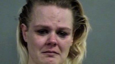 Woman arrested after baby found in Iroquois home with dog feces, cockroaches