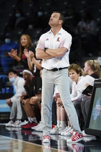 Louisville head coach Jeff Walz looks on from the sideline against Georgia | Louisville head coach Jeff Walz looks on from the sideline against Georgia |