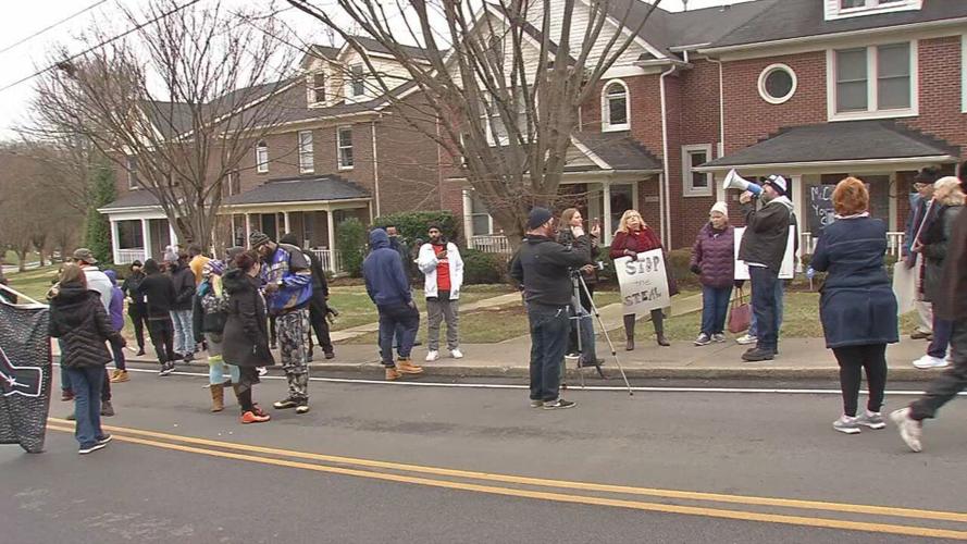 Protesters gather outside Mitch McConnell's home 1-02-21