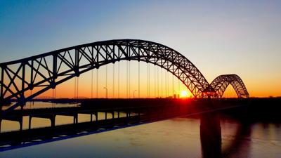 Sherman Minton Bridge with sunrise in background