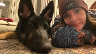 Emmerson the German Shepherd with owner Alyssa White