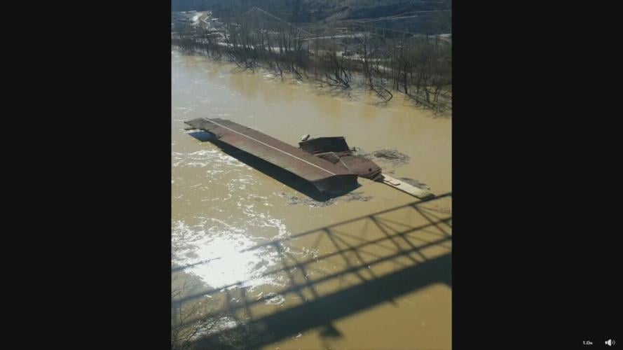 Marina floats down Kentucky River-Flooding-3-3-21.jpeg