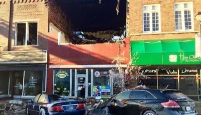 Historic block in Seymour battles back after huge fire last year