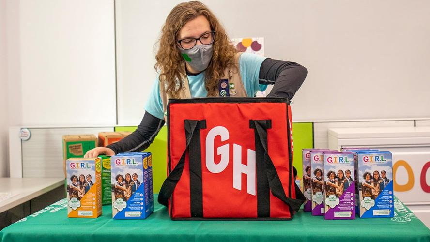 Girl Scout Cookies loaded into bag