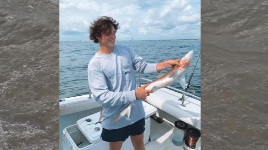 Jake Stover with fish.png