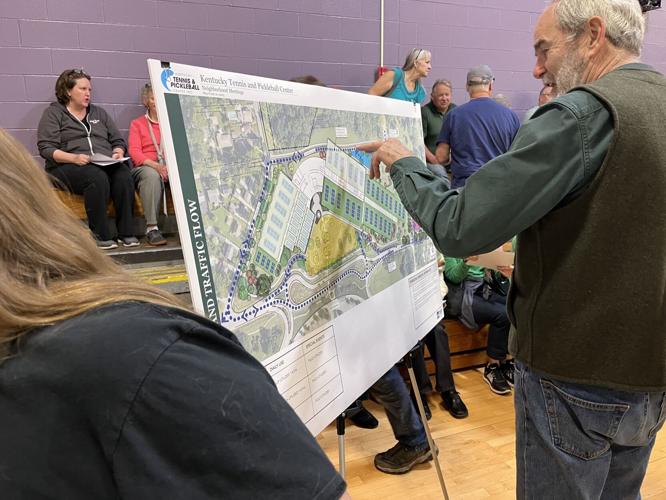 Joe Creason Park tennis and pickleball public meeting - man looking at rendering