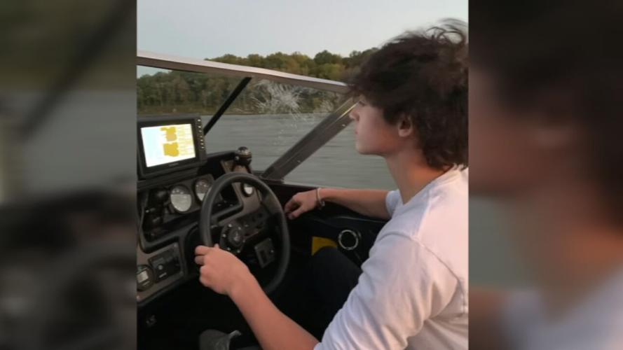 Jake Stover on boat.jpeg