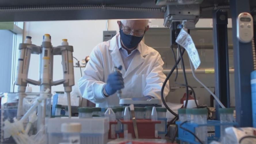 Scientist in lab vaccine.jpeg