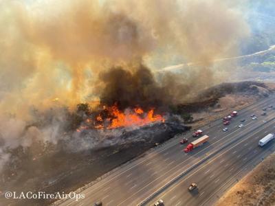 Wildfire forces closure of part of freeway in California