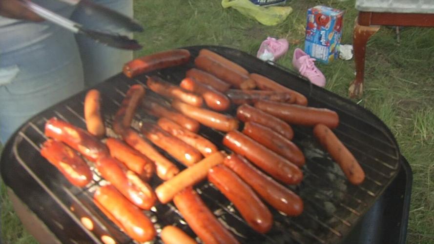 Hotdogs on grill.png