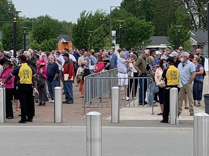 People wait in line to get into Churchill Downs on Wednesdsay 4-28-21.jpg