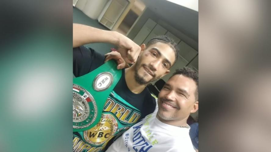 Louisville boxer Carlos Dixon with his coach (and father) James Dixon