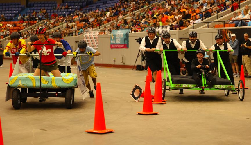 Team vie for position in Bed Races.JPG