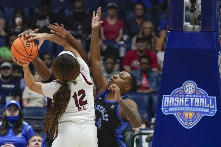 South Carolina's Brea Beal battles for the ball with Kentucky's Dre'una Edwards.jpeg