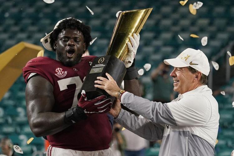 nick saban and alex leatherwood 1-12-21 ap.jpeg