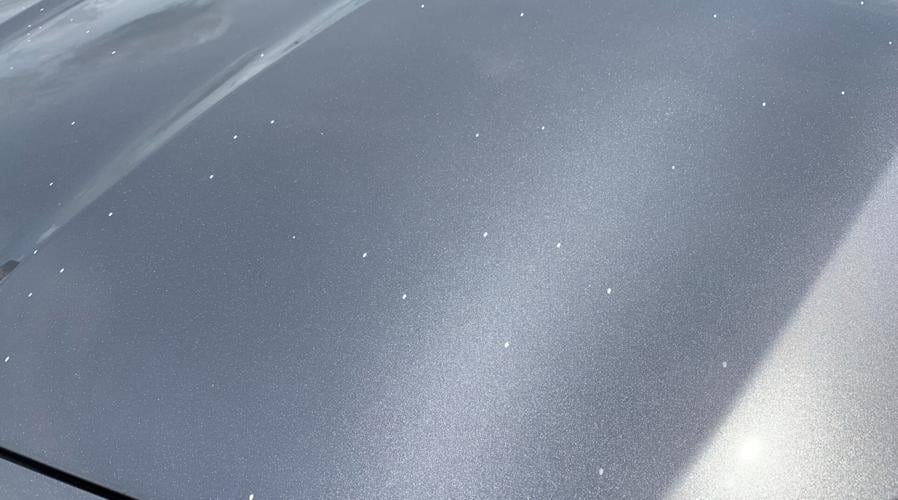 Spatter from paint that dripped from the Sherman Minton Bridge onto Mike Scheser's car