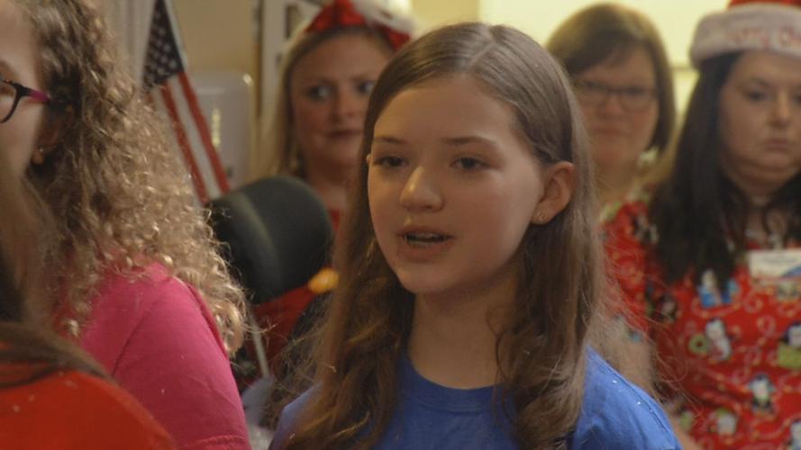 JCPS STUDENTS DELIVER CHRISTMAS CARDS TO SENIOR CITIZENS (14).jpg