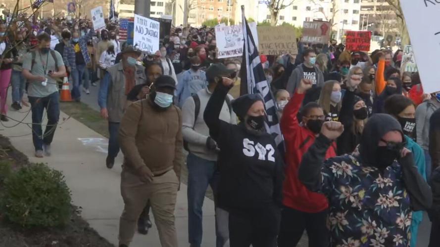 Protesters march through Louisville, Ky., on Saturday, March 13, 2021