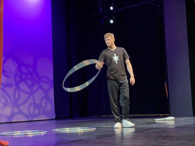CirqueLouis 2019 performer with hoop.jpeg