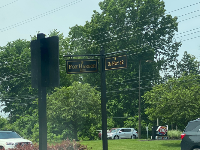 Fox Harbor Road and US 42 Sign in Prospect