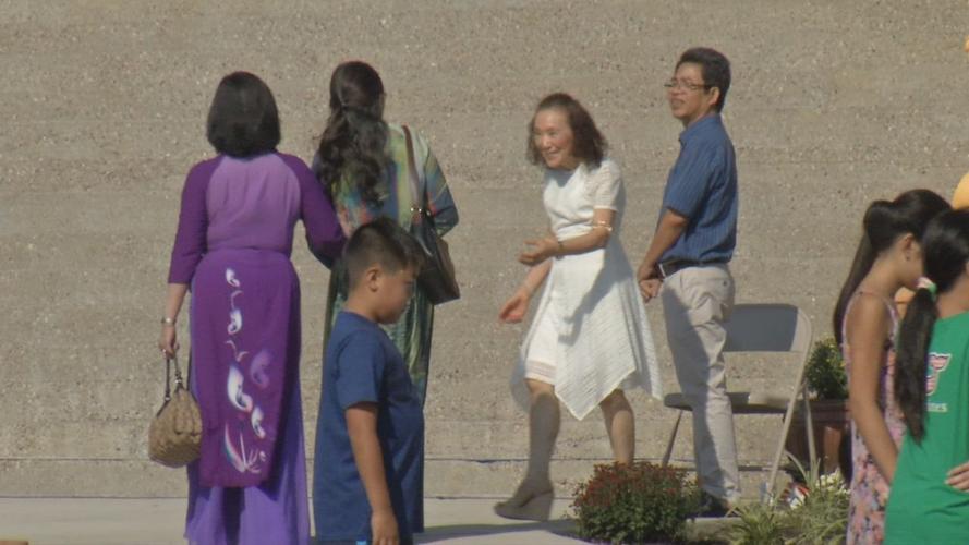 People at Buddhist temple opening