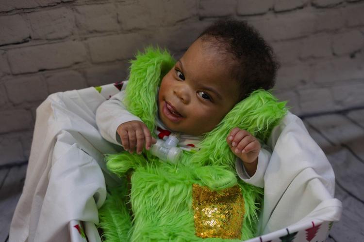 Baby looks at camera for Christmas.jpeg