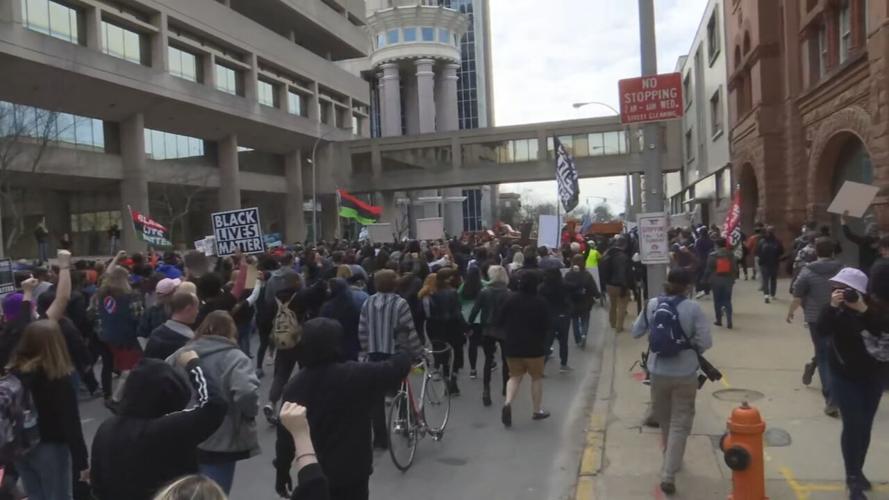 Protesters march through Louisville, Ky., on Saturday, March 13, 2021