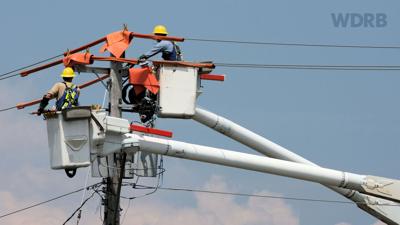 POWERLINES - UTILITY WORKERS ELECTRICITY - ISTOCK