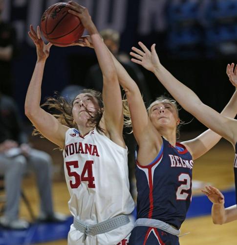 Indiana forward MacKenzie Holmes (54) grabs a rebound next to Belmont forward Conley China