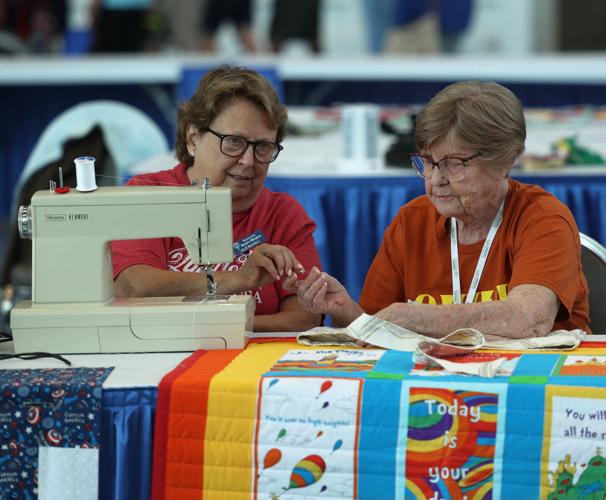 Two women stitch at Kentucky State Fair.JPG