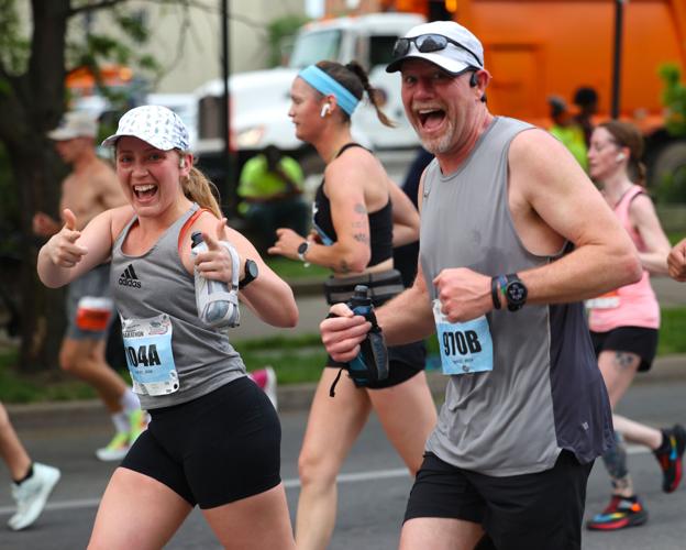 Two runners look at camera during Marathon.JPG