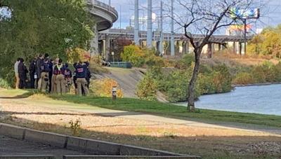 Investigators gather on scene where body spotted in Ohio River on Oct. 18, 2022