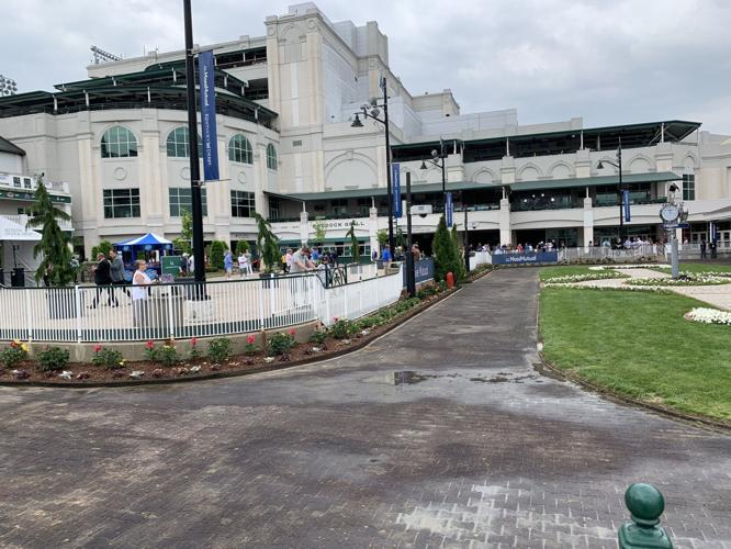Crowd waits to watch horses come through paddock at Churchill Downs 4-28-21.jpg
