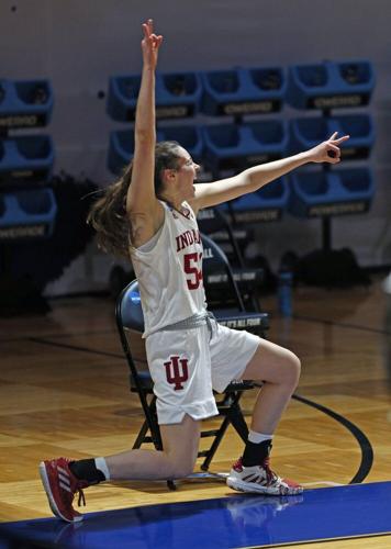 Indiana forward MacKenzie Holmes (54) celebrates a basket against Belmont