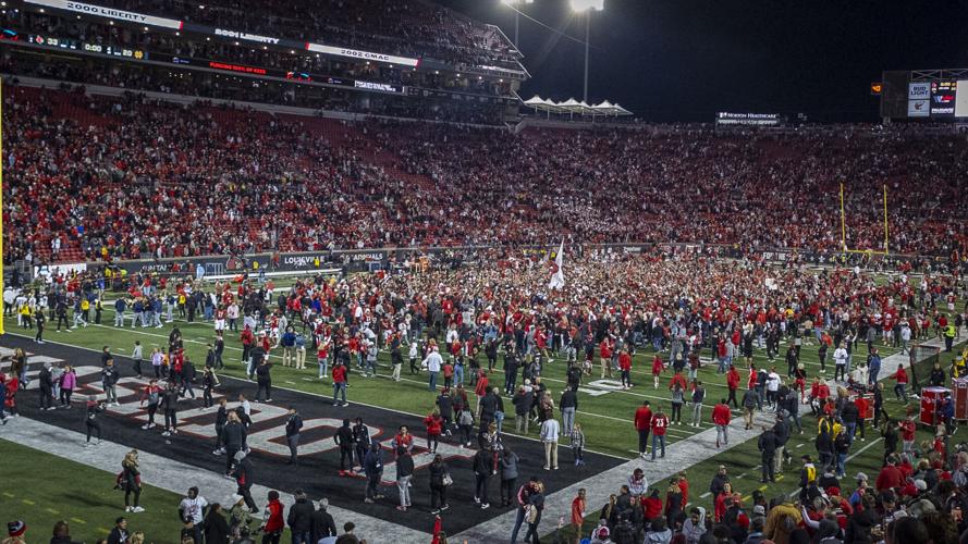 Louisville fans storm the field