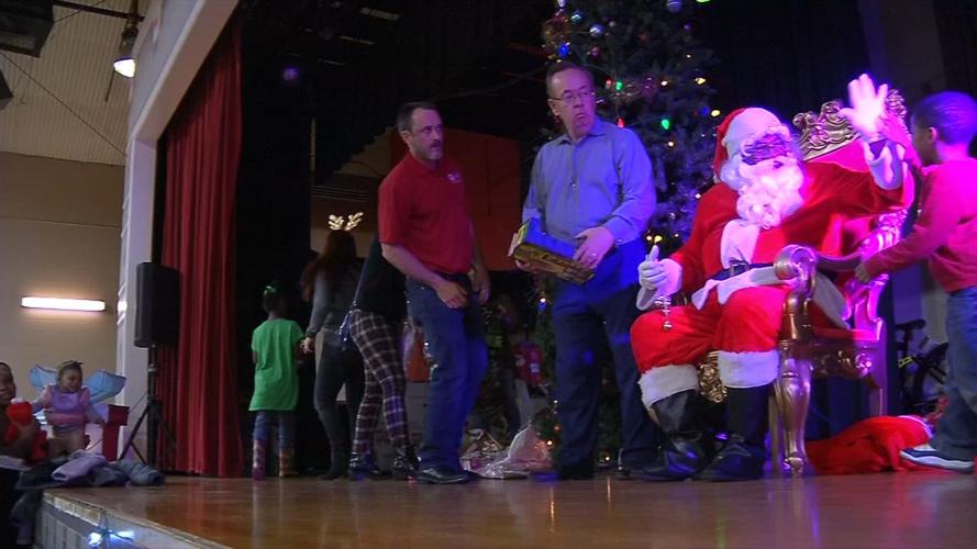 Santa visits hundreds of children at community event in Park Hill neighborhood