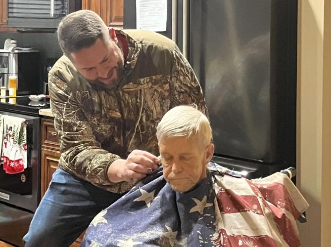 US veteran receives a haircut