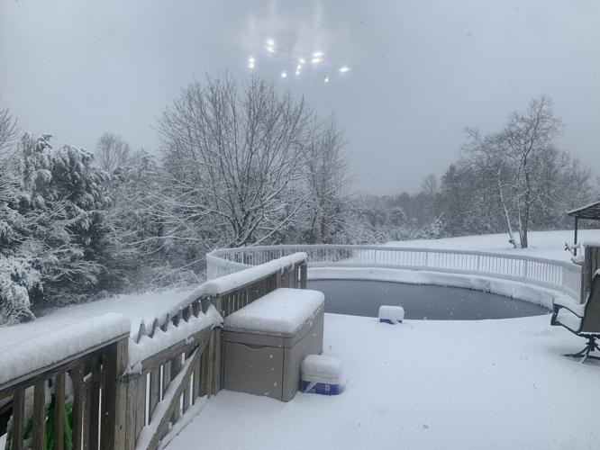 Snow-covered deck and pool in Balltown, Kentucky