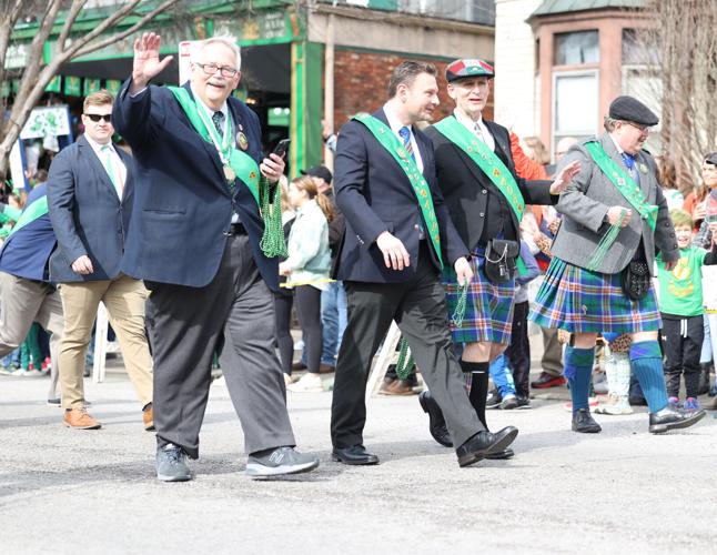 Men walk together at parade