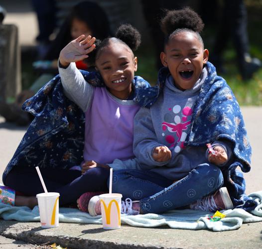 Girls with McDonalds wave to camera.JPG
