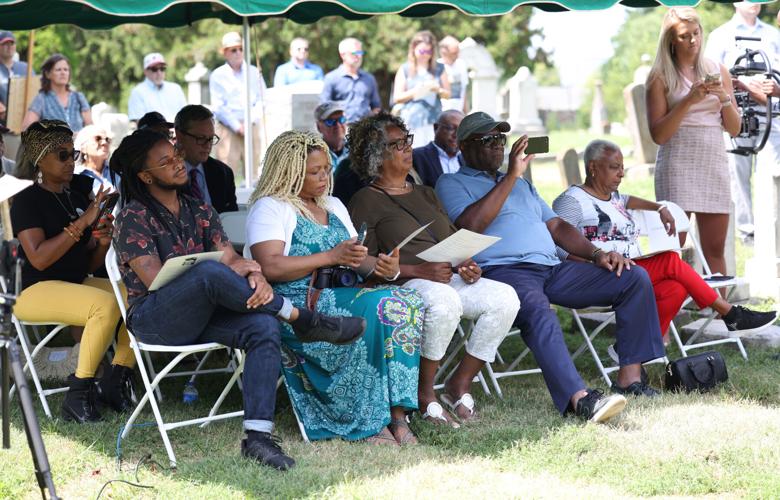 Family of Felton Snow sits together at ceremony
