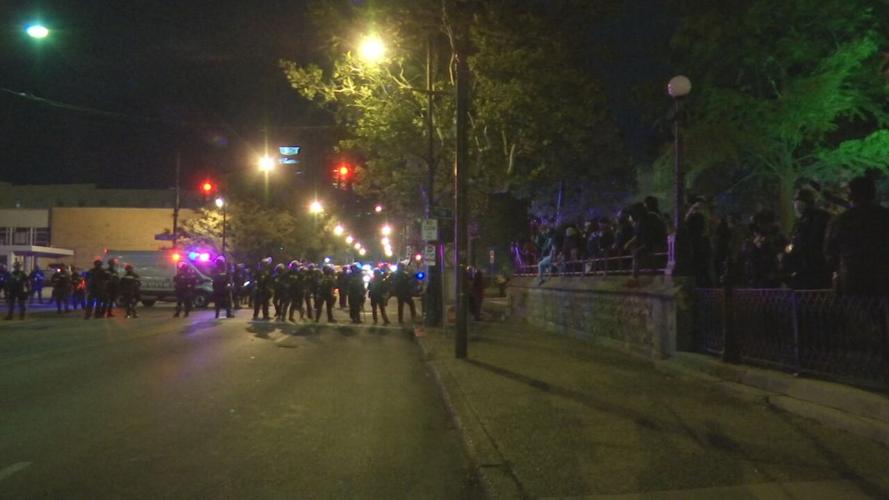 Police and protesters gather outside First Unitarian Church 9/24/20