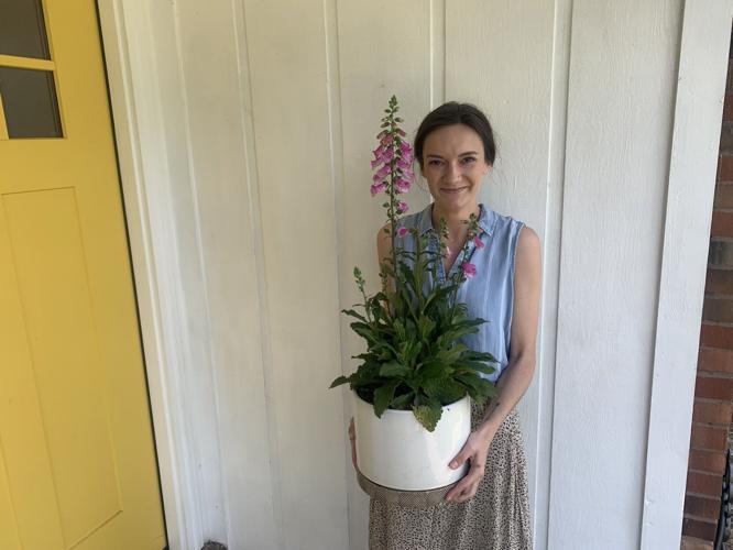 Kayla Blackerby with her flower plant