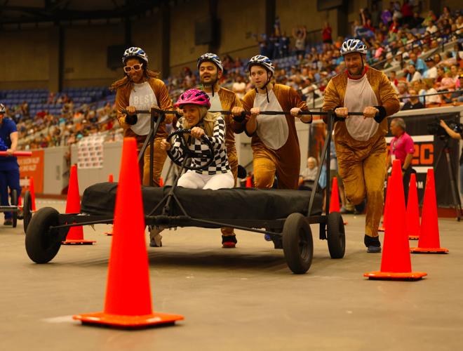 Team pushes forward at Bed Races.JPG